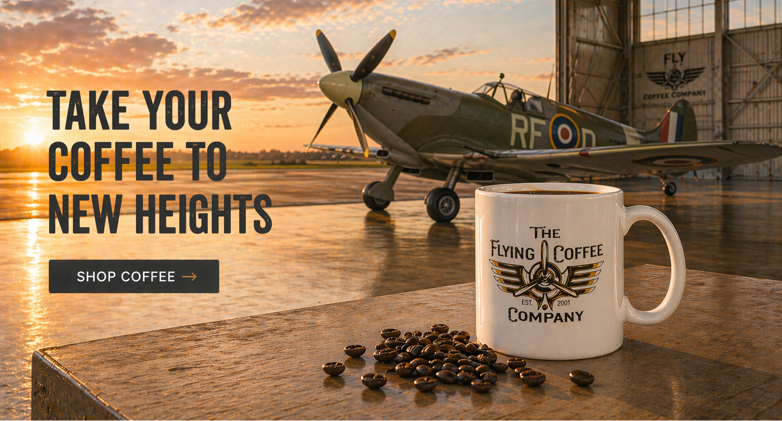 White mug with 'The Flying Coffee Company' logo on a wooden table with coffee beans, vintage airplane in the background.
